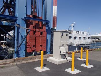 An onshore power supply facility with a workboat while at berth